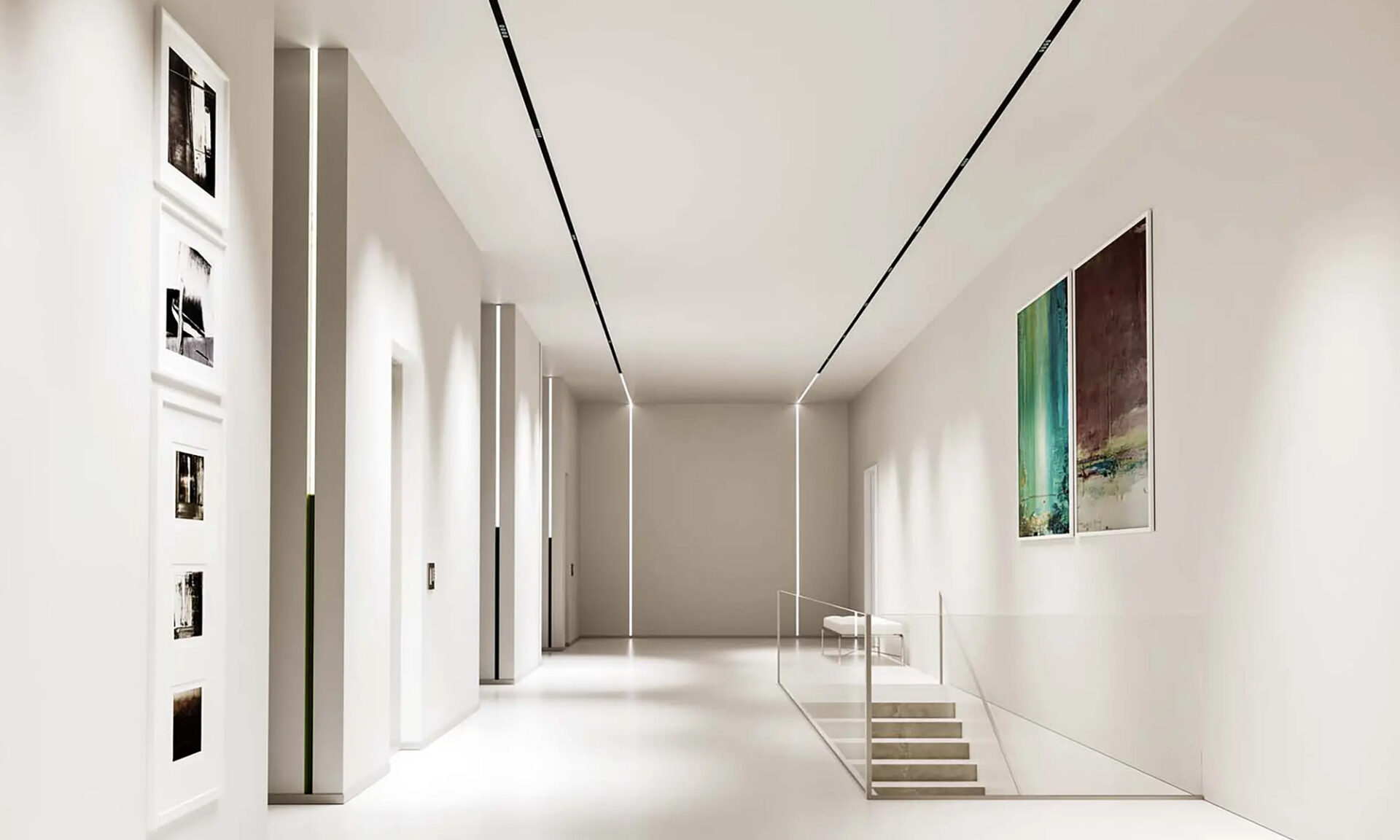 Photograph of a modern corridor with linear and recessed lighting creating a clean, contemporary look.