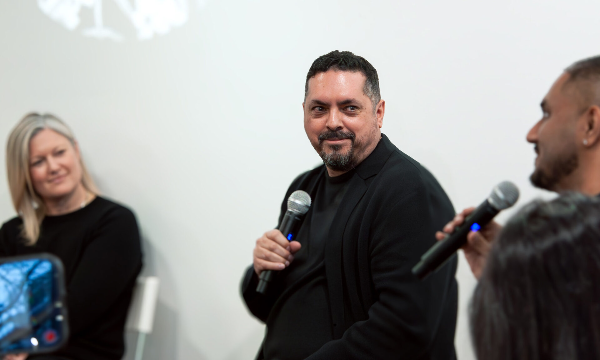Victor Quezada, architectural lighting lead at AES Engineering, speaking during the “Who Moved My Light?” panel discussion.